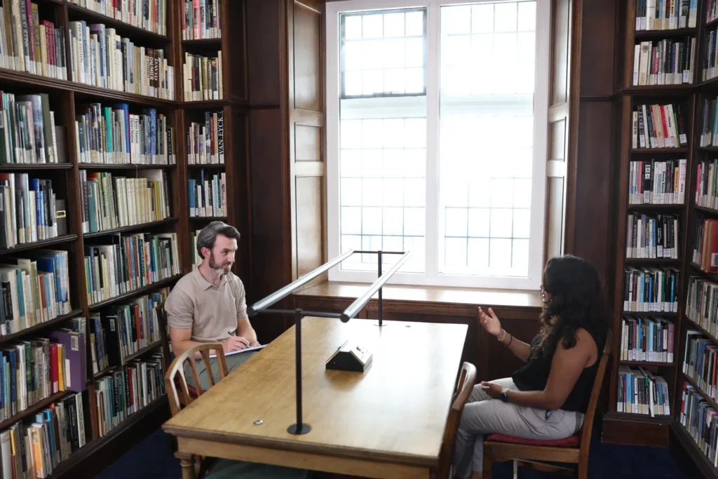 Ryan Hegarty speaking with a client during a private therapy session