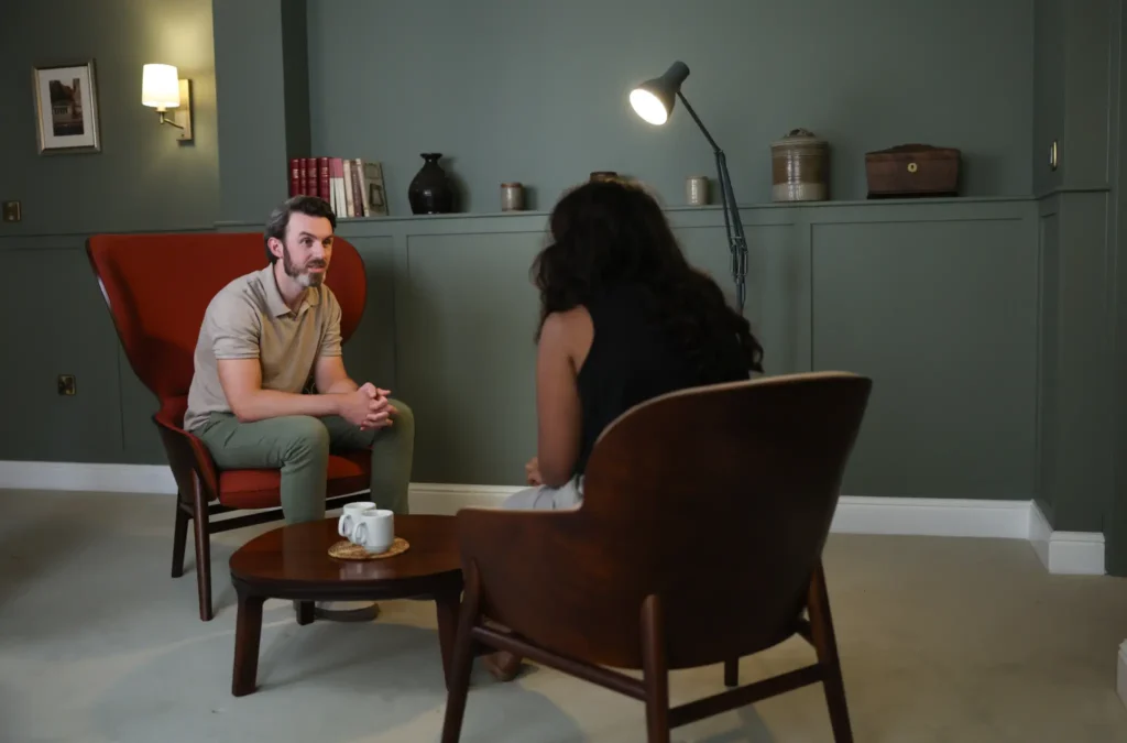 Ryan Hegarty speaking with a client during a private one-to-one therapy session in Essex